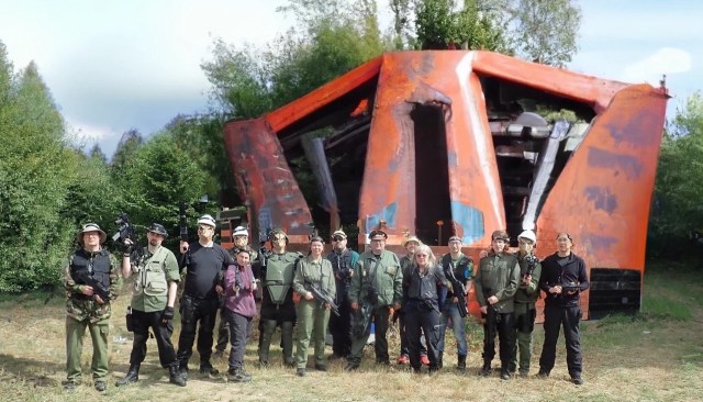 The Days After cast in front of Dalle rendered The Glorious Flames of Emmetts Glory Will Never be Forgotten (Kristang Troop Carrier)